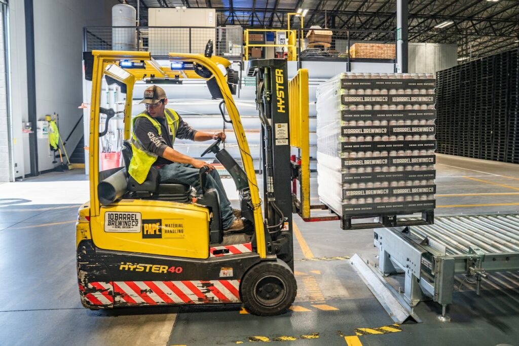 Man lifting pallets